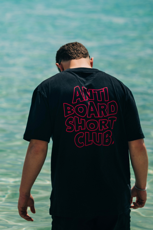 Pink Anti Board Short Club on Black Tee
