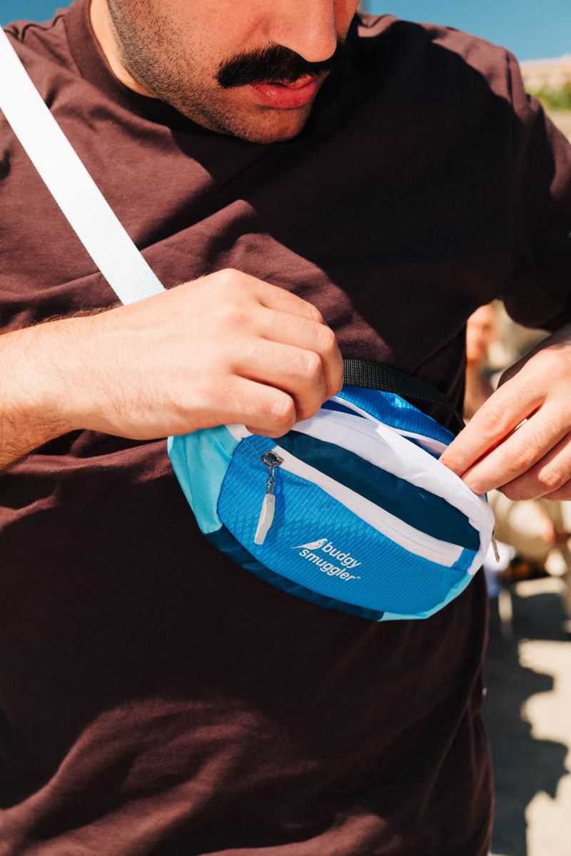 Unisex Blue bum bag on a shoulder 