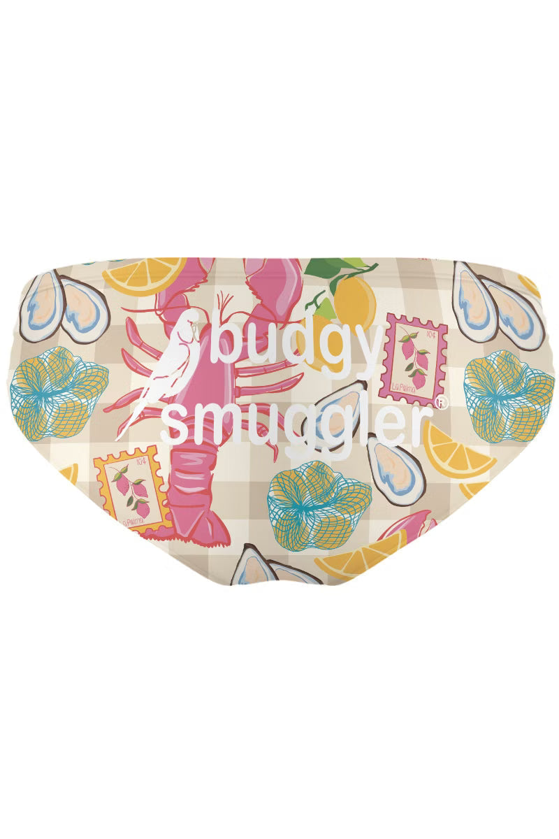 Mens swimwear with a pink check lobster pattern, on a white background 